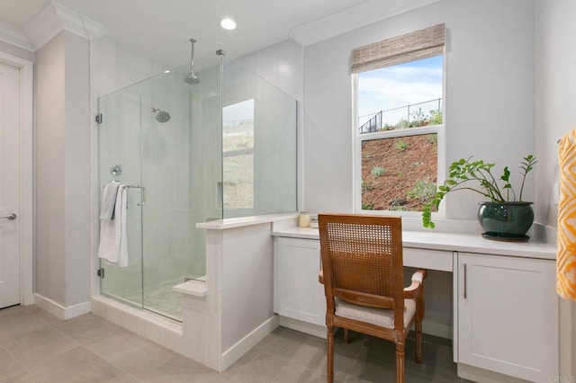 bathroom with walk in shower, ornamental molding, and tile patterned flooring