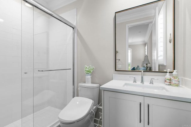 bathroom with a shower with door, crown molding, vanity, and toilet