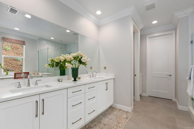 bathroom with vanity, tile patterned flooring, a shower with shower door, and ornamental molding