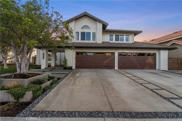 view of front of home with a garage