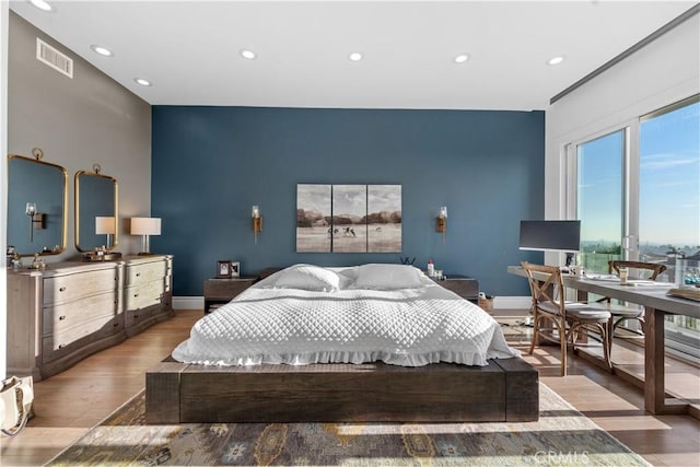 bedroom featuring light wood-type flooring