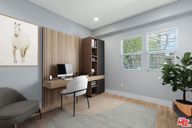 office space featuring light wood-type flooring