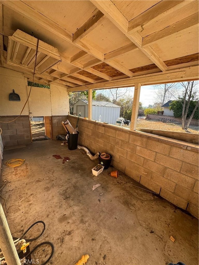 view of patio / terrace featuring a shed