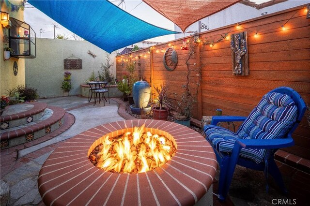 1425 Russell Dr, Long Beach, CA 90804 - view of patio with a fire pit