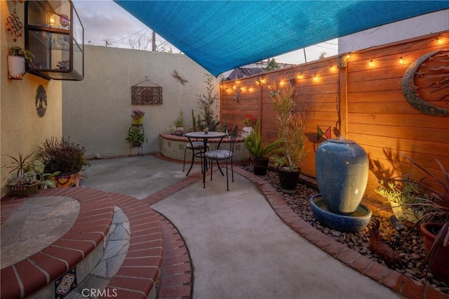 view of patio / terrace with fence