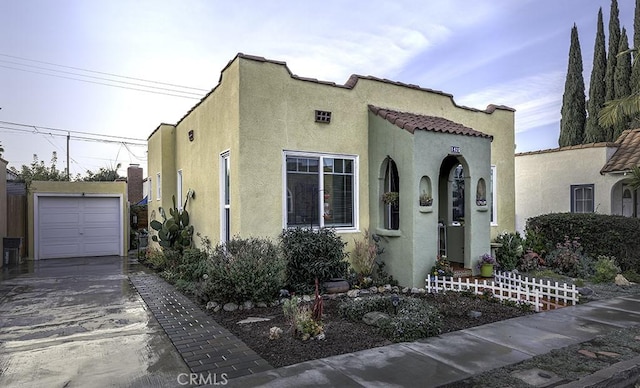 1425 Russell Dr, Long Beach, CA 90804 - view of front of property featuring stucco siding, concrete driveway, a garage, an outbuilding, and a tiled roof