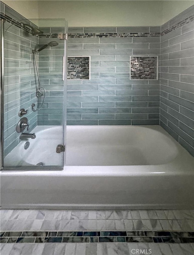 full bath with enclosed tub / shower combo