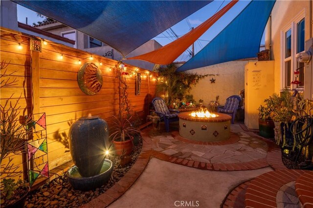 1425 Russell Dr, Long Beach, CA 90804 - view of patio / terrace with an outdoor fire pit