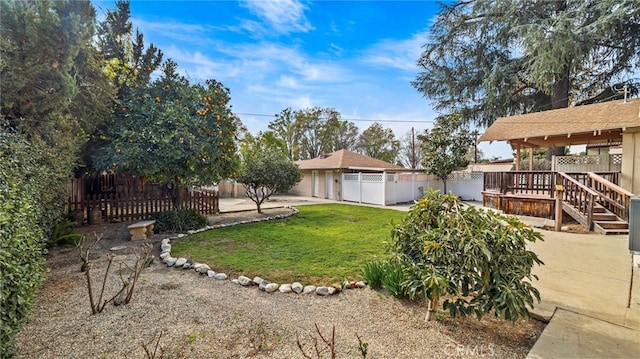 view of yard featuring a wooden deck