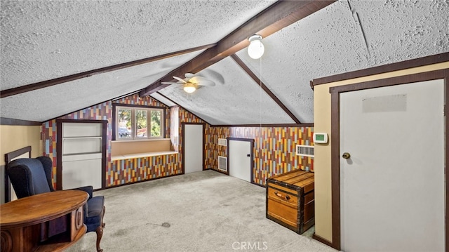 bonus room featuring light carpet, vaulted ceiling with beams, a textured ceiling, and ceiling fan