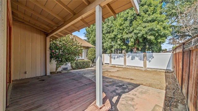 wooden deck featuring a patio area