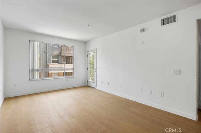 empty room featuring light wood-type flooring