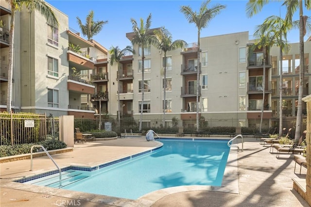 view of pool featuring a patio