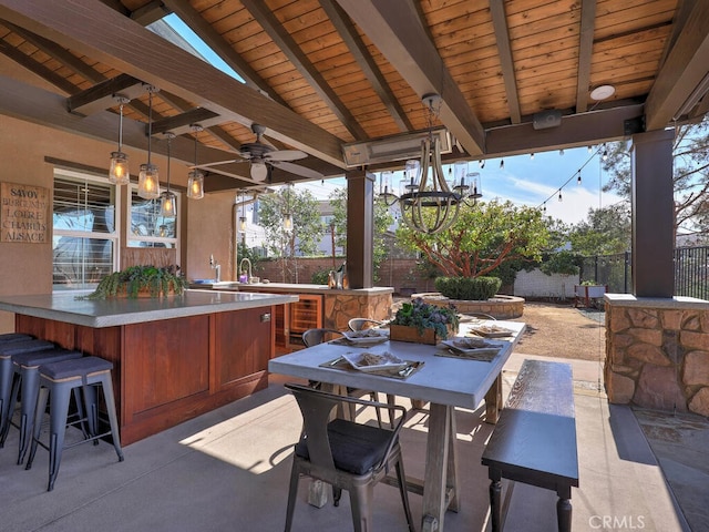 view of patio / terrace with a gazebo, an outdoor bar, and ceiling fan