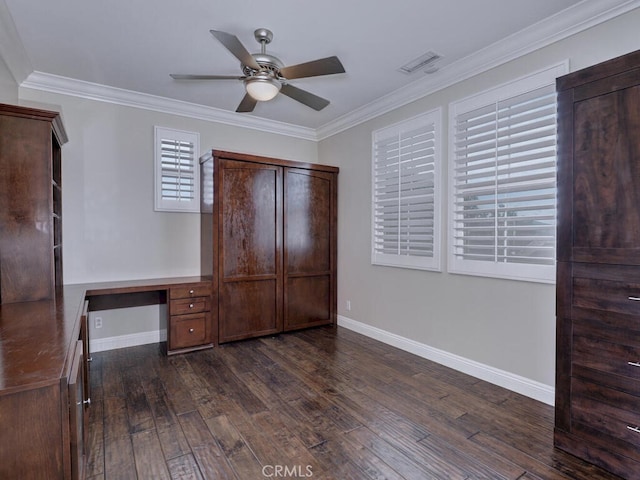 bedroom featuring crown molding, ceiling fan, dark hardwood / wood-style flooring, and built in desk