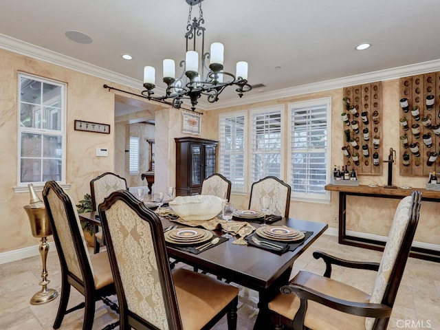 dining area featuring crown molding and a healthy amount of sunlight