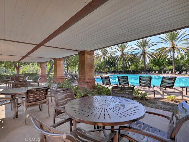 view of patio / terrace featuring a community pool