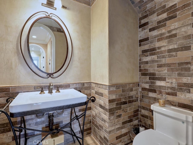 bathroom with toilet and sink