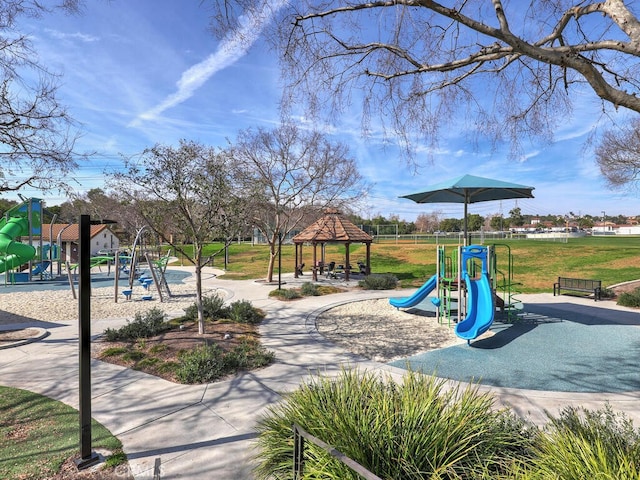 view of play area with a yard and a gazebo