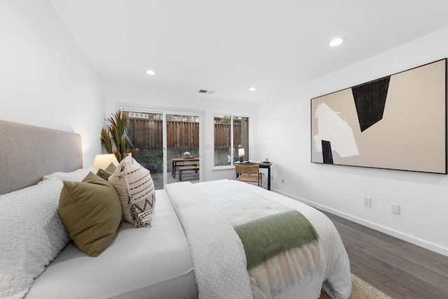 bedroom with hardwood / wood-style flooring and access to outside