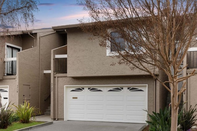 view of front of property featuring a garage