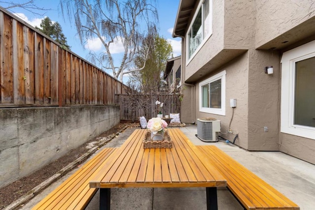 exterior space featuring central AC unit