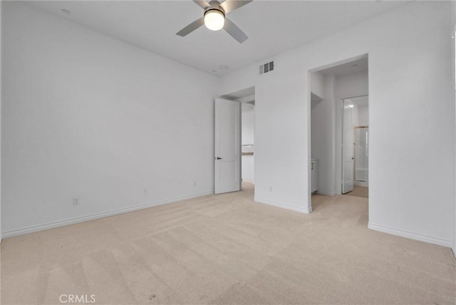 unfurnished bedroom with light carpet and ceiling fan