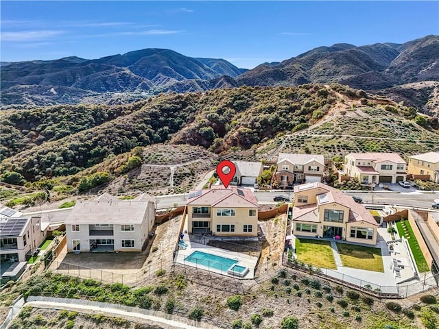 drone / aerial view featuring a mountain view