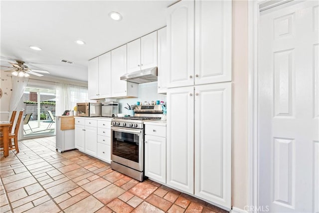 kitchen featuring white cabinetry, appliances with stainless steel finishes, and ceiling fan