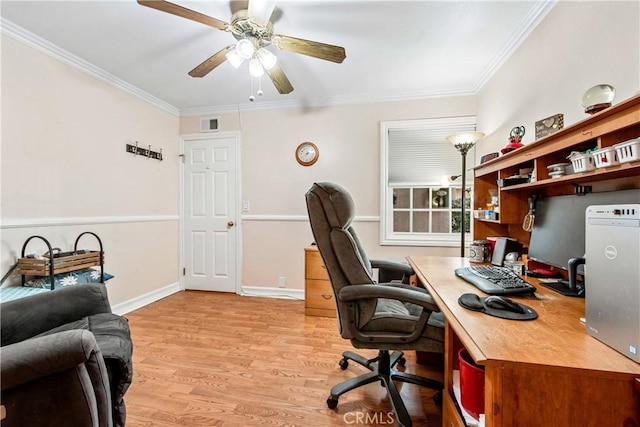 office with ornamental molding, ceiling fan, and light hardwood / wood-style flooring