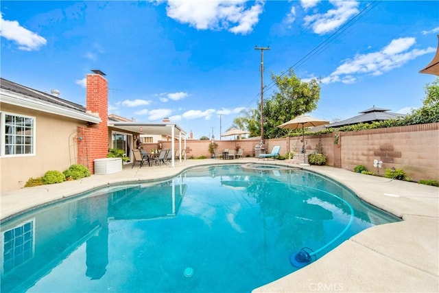 view of pool with a patio