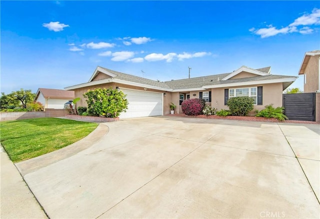 ranch-style home with a front lawn and a garage