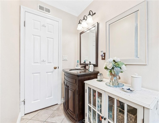 bathroom with vanity and tile patterned floors