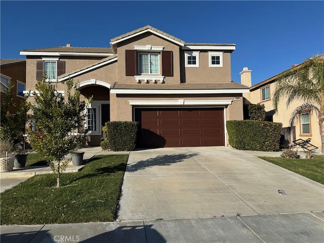 front facade with a garage