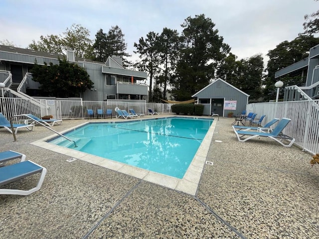 view of pool featuring a patio