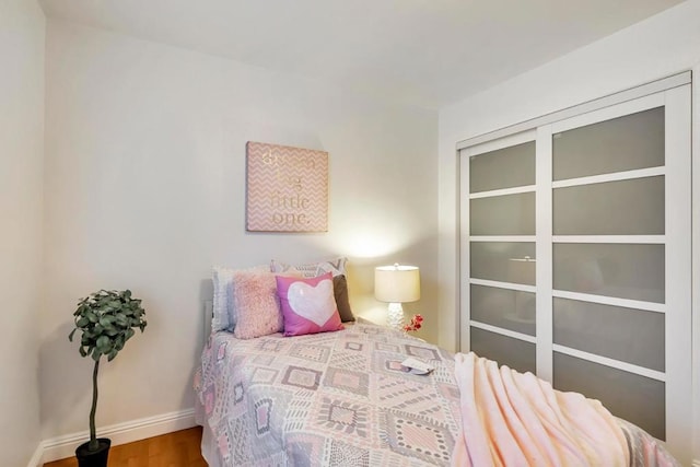 bedroom featuring hardwood / wood-style flooring