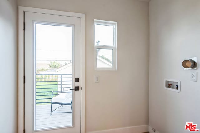 doorway to outside with plenty of natural light