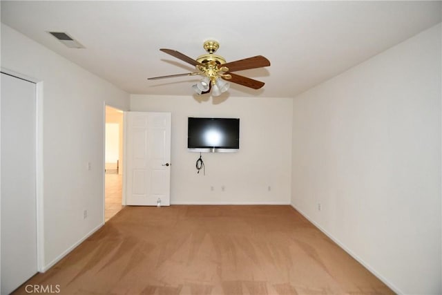 unfurnished room featuring carpet flooring and ceiling fan