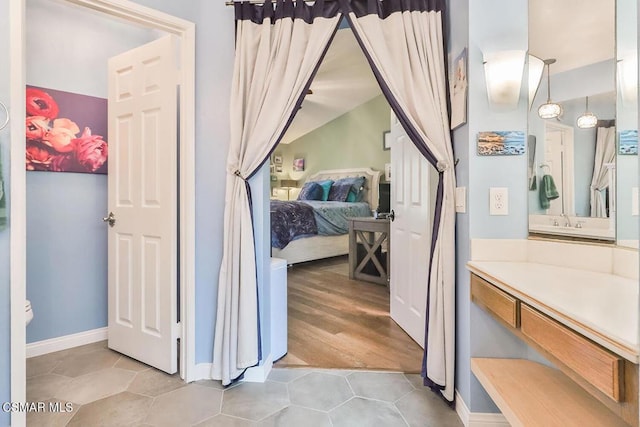 bathroom featuring vanity and tile patterned floors