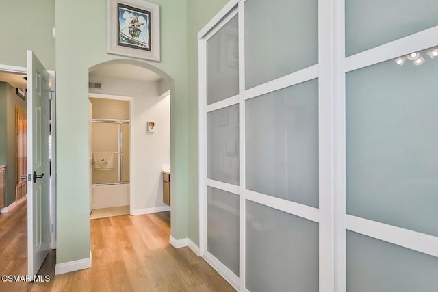 hall featuring light hardwood / wood-style flooring