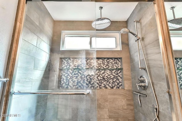 bathroom with an enclosed shower