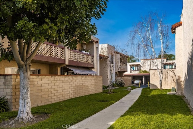 exterior space featuring a lawn