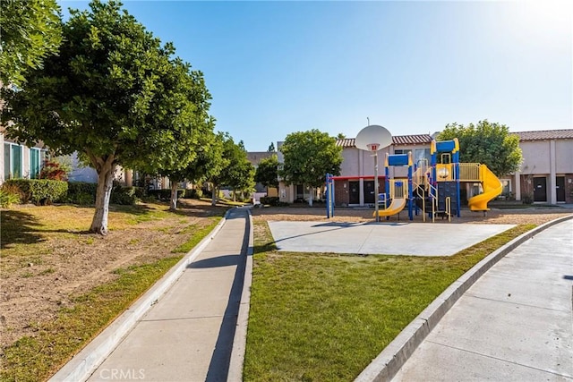 view of playground with a yard