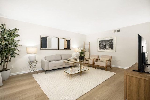 living room with hardwood / wood-style floors