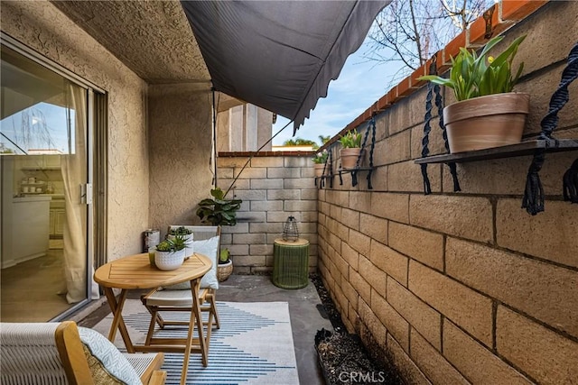 balcony featuring a patio area