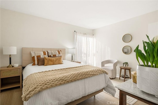 bedroom featuring hardwood / wood-style floors