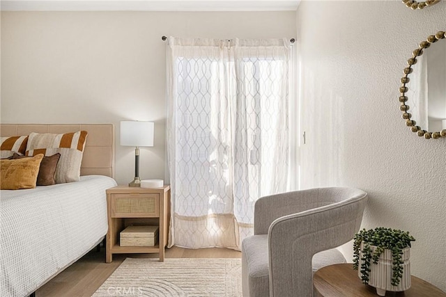 bedroom featuring light hardwood / wood-style flooring