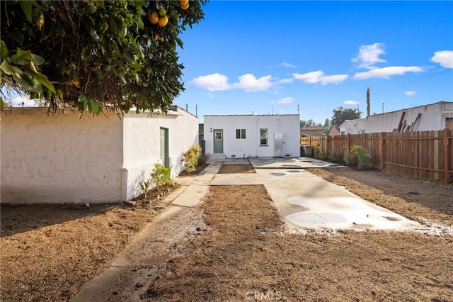 back of house featuring a patio area