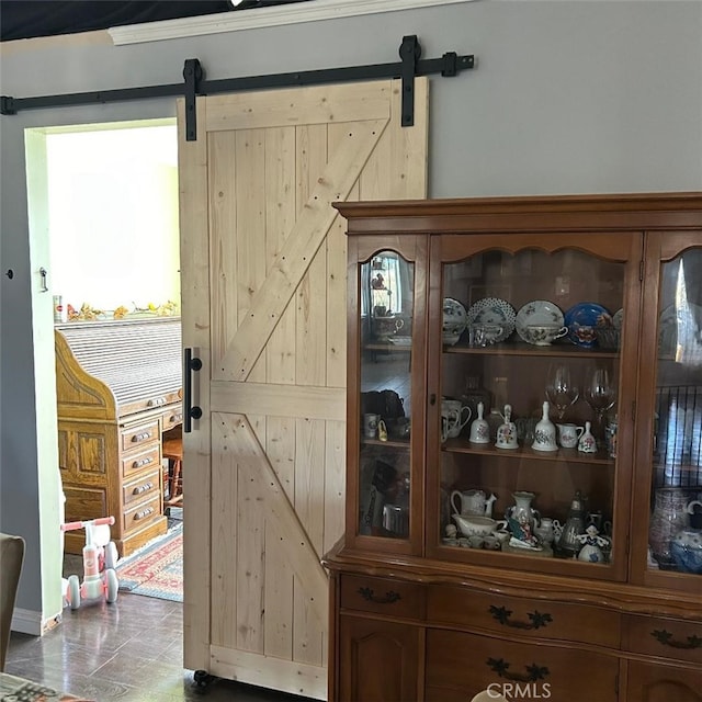 interior space featuring a barn door