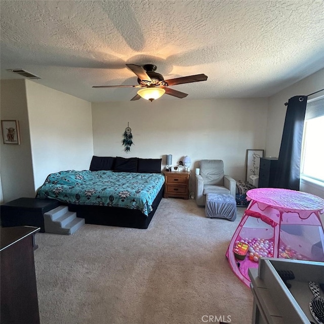 bedroom featuring carpet flooring and ceiling fan